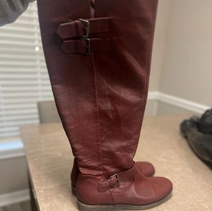 A pair of JustFab boots